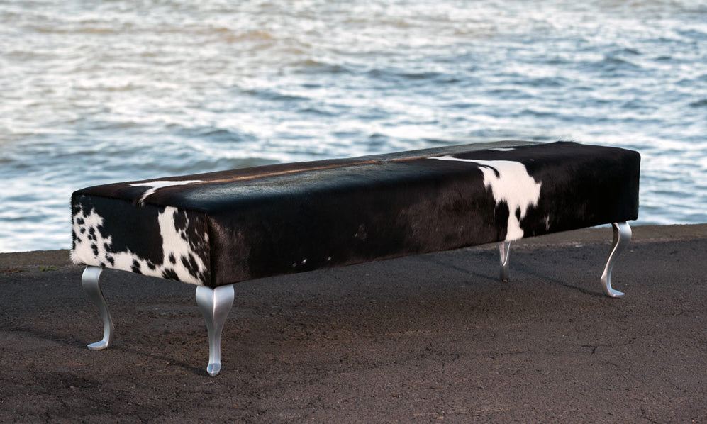 Long bench ottoman in cowhide
