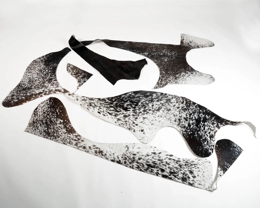 Leather pieces in black and white speckles 