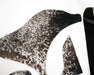 Close up of Leather pieces in black and white speckles 