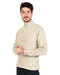 Man wearing a beige half-zip sweater made from possum merino wool