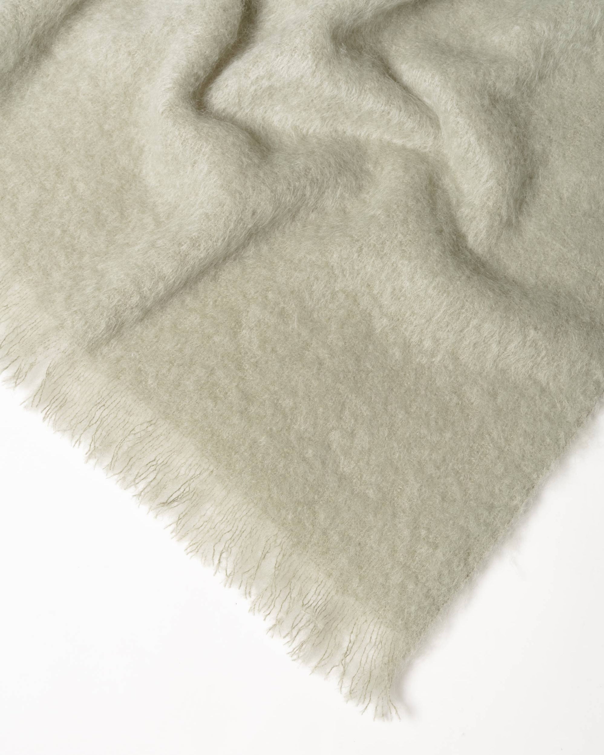 NZ Cowhide Ottoman, Mohair & Alpaca Blankets — Creatures
