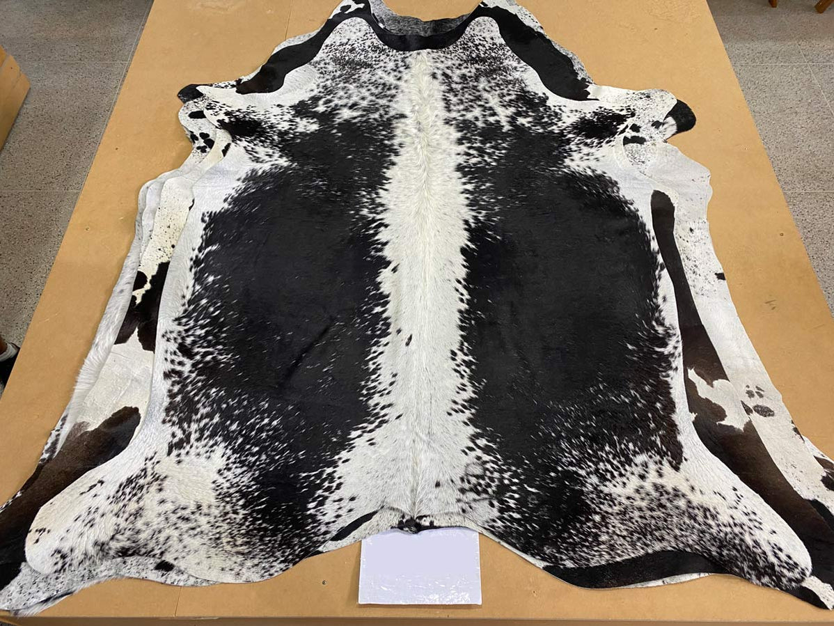 Black and White Cowhides Rugs — Creatures