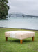 Square cowhide ottoman in beige and white cowhide