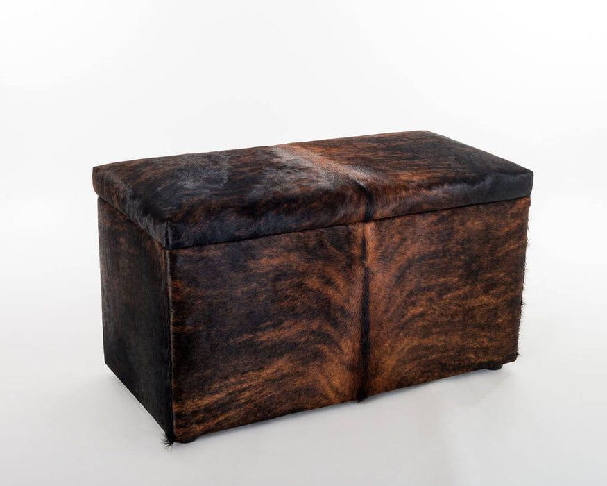 Storage ottoman in cowhide by Gorgeous Creatures